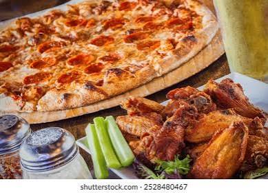 Any Large Pizza (6 Pcs Hot Wings ,4 Pcs Garlic Bread , Bottle of Soft Drink