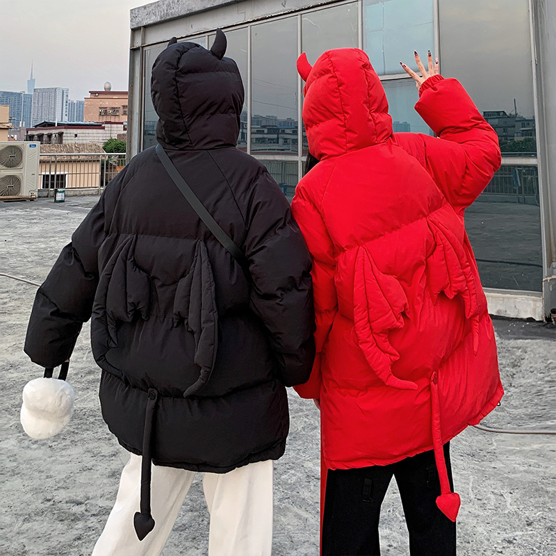 Oversized women's quilted jacket with hood and cartoon motif