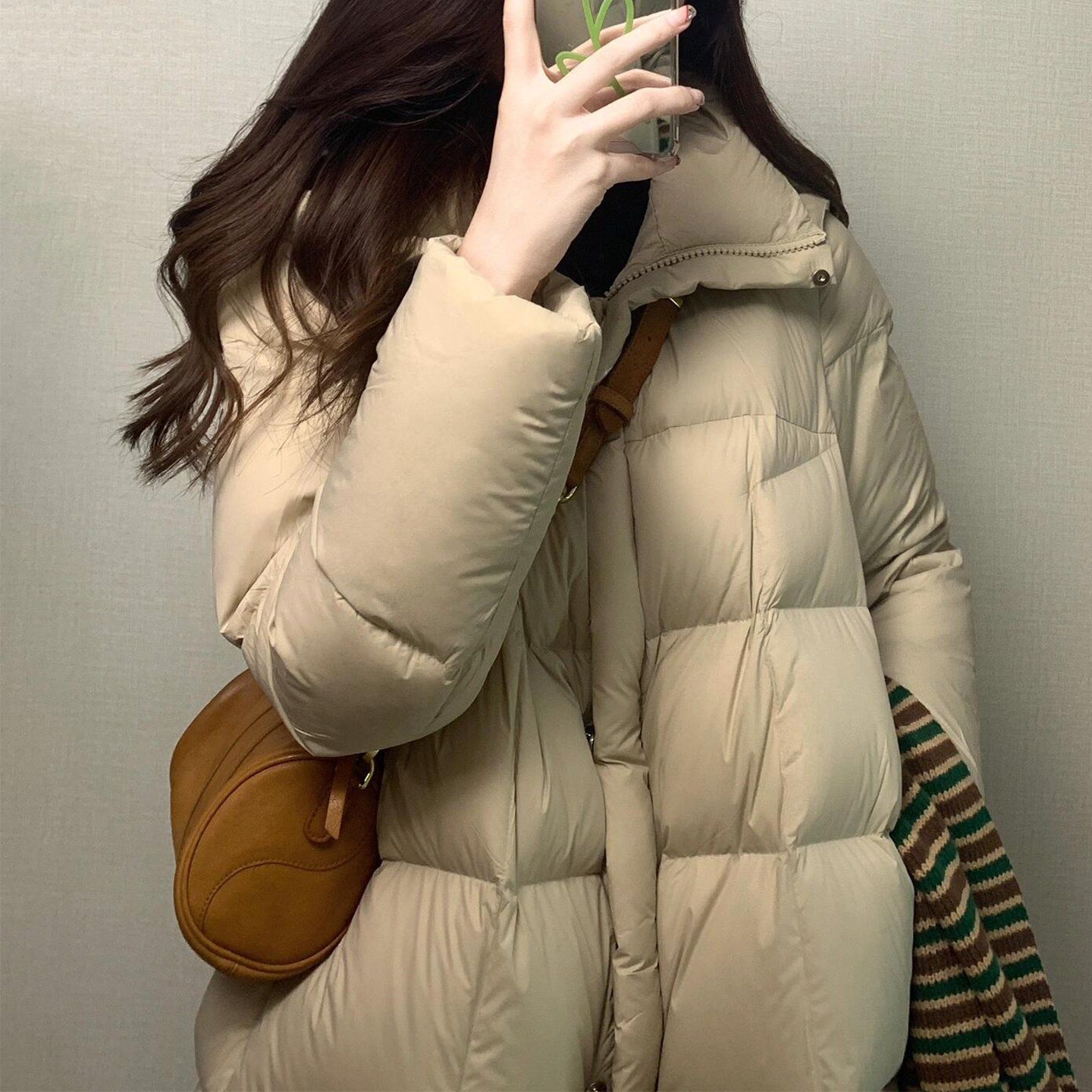 Mid-length women's puffer jacket in Korean style