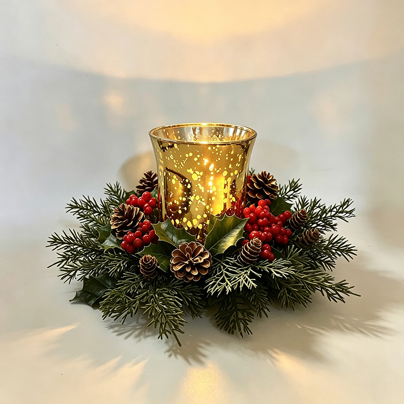 Christmas candle wreath with red berries and pine needles