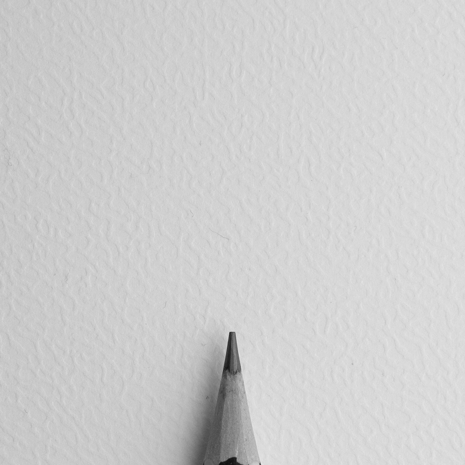 Download Minimalist Sharpened Black Pencil 2K iPhone