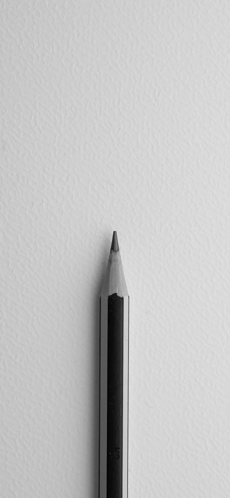 Minimalist Sharpened Black Pencil - Minimalist Photography 2K iPhone Wallpaper (1803x3906)