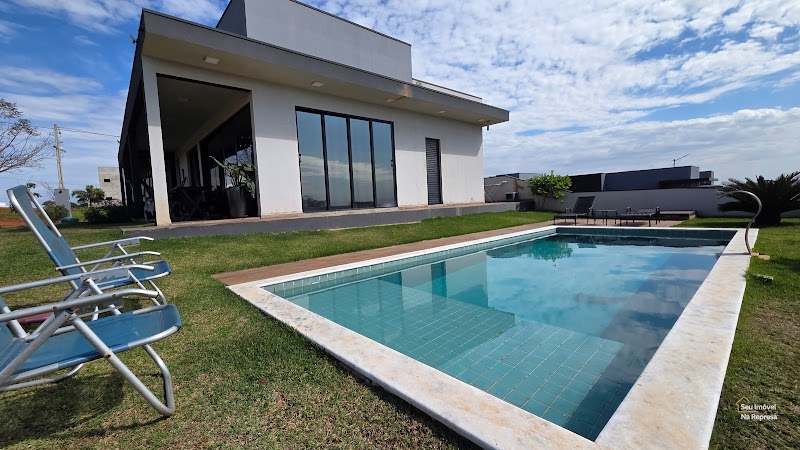 Foto 4 de Casa com 2 lotes 900m² à venda no Riviera de Santa Cristina XIII