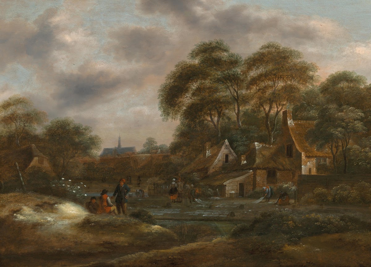 A wooded landscape with a village