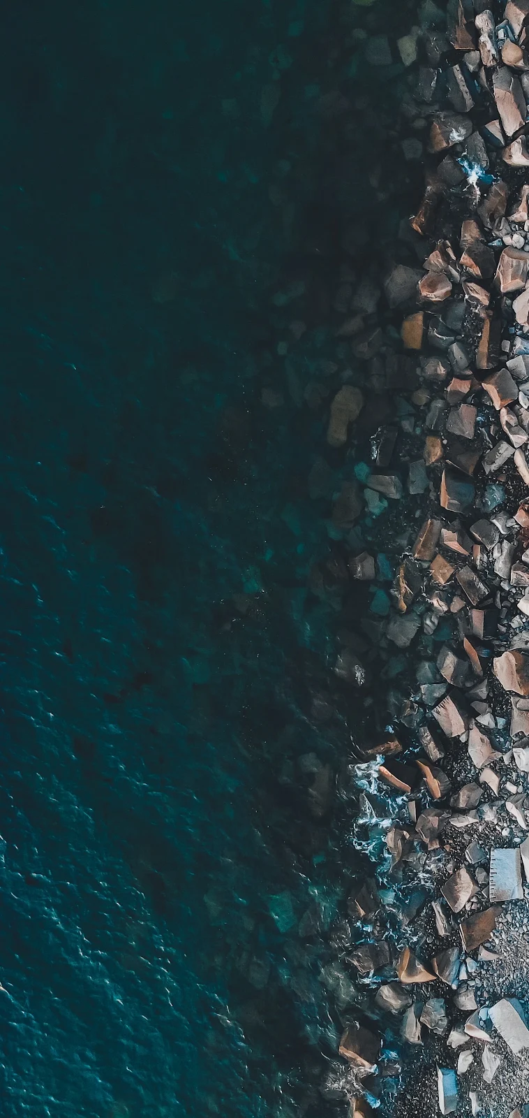 Rocky Coastline and Blue Water - Aerial Photography 2K iPhone Wallpaper (1440x3040)
