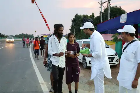 Seva continues as the light fades.