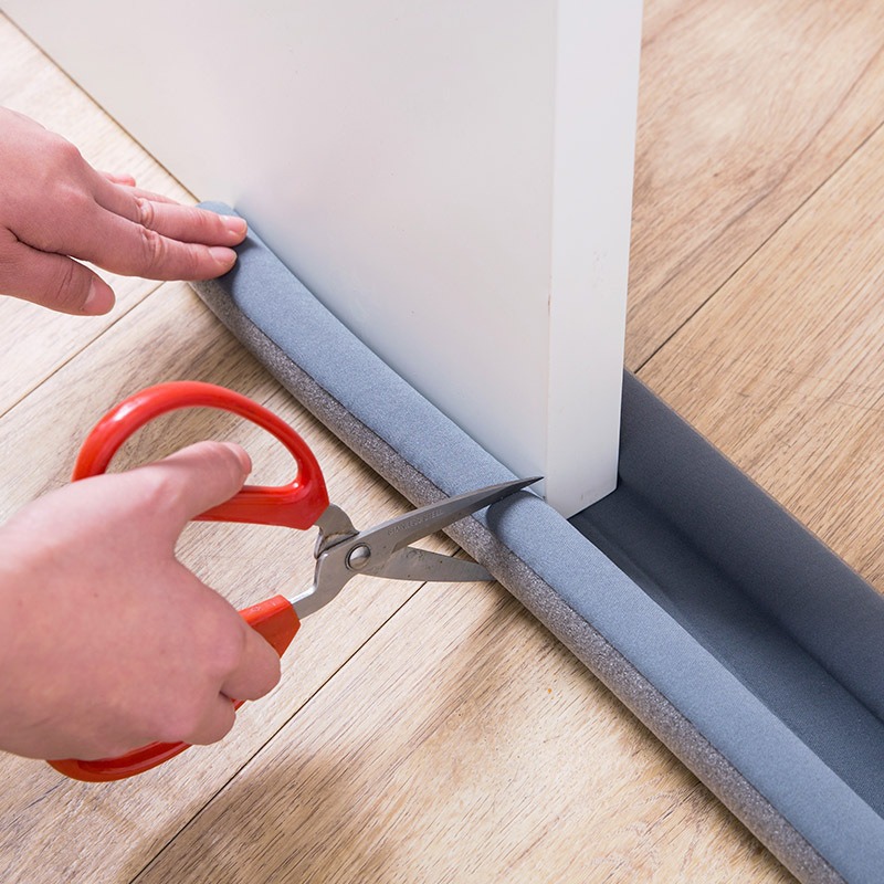 Door bottom seal, universally adjustable