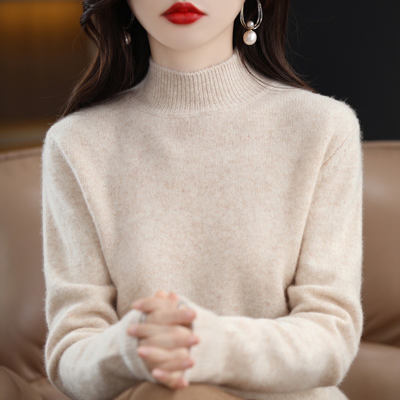 Women's wool sweater with high collar and ribbed texture