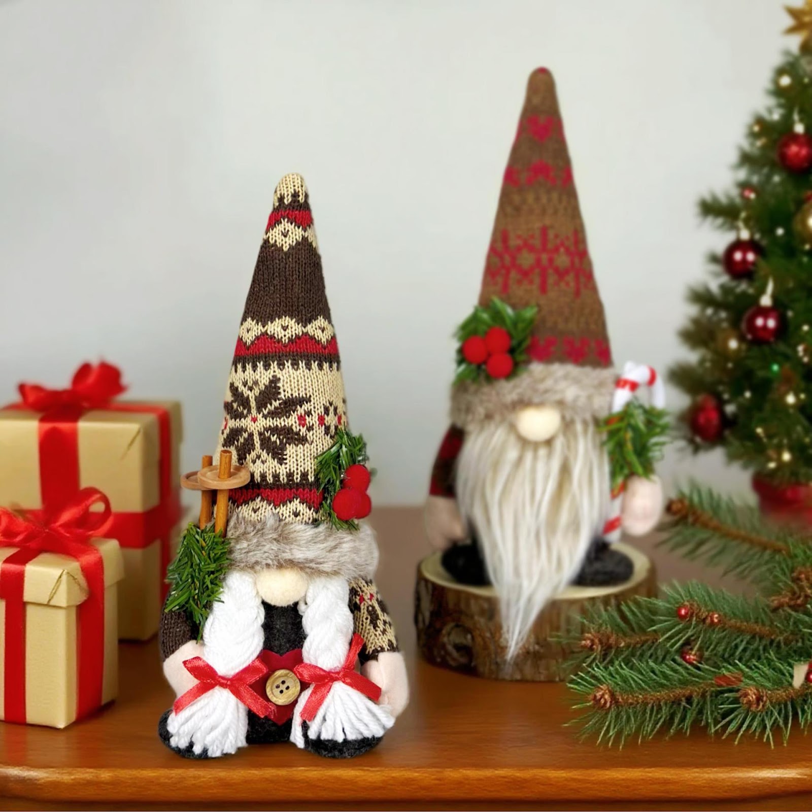 Christmas gnome figure with knitted hat and branch