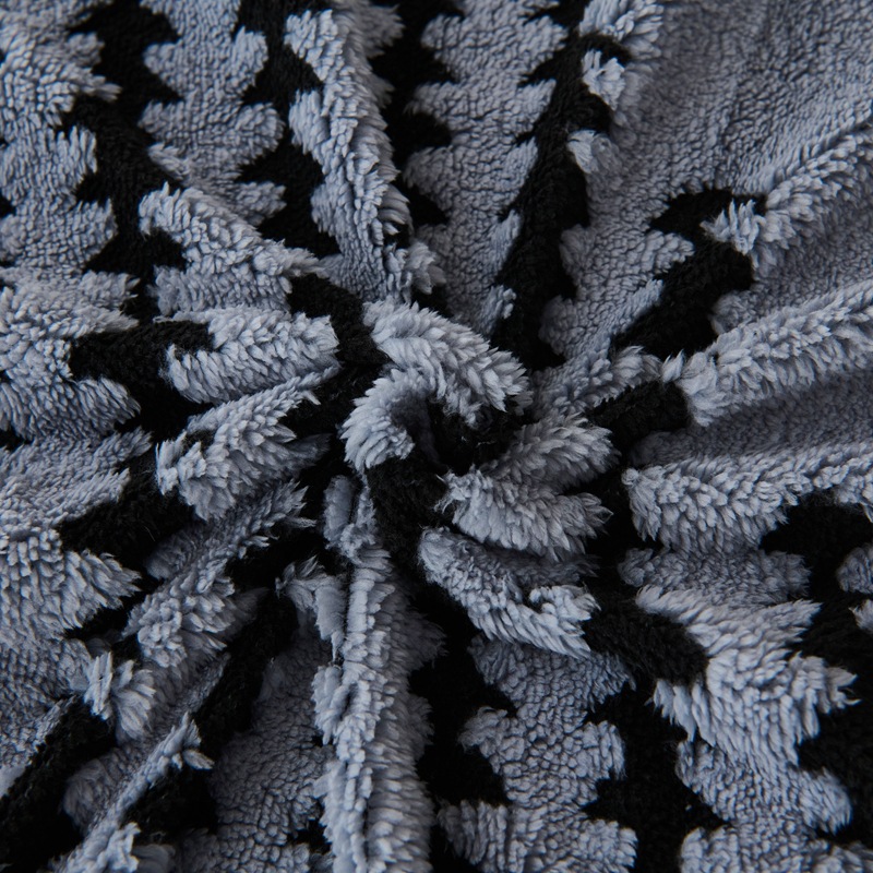 Double-layered living blanket with lamb fleece look