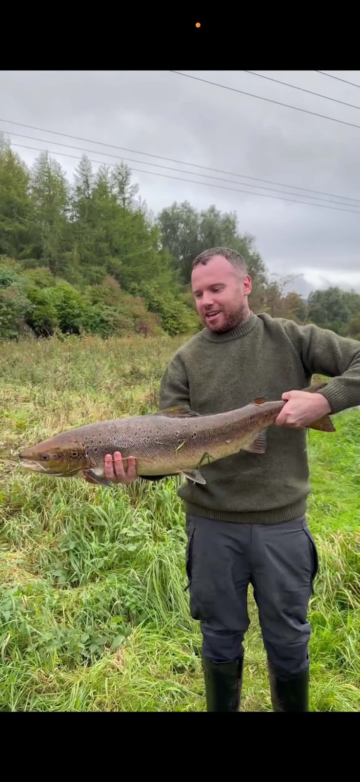John Pearson with a Salmon caught while trotting worm on the Black Cart
