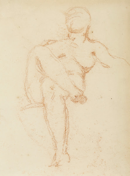 Femme nue assise jambes croisées