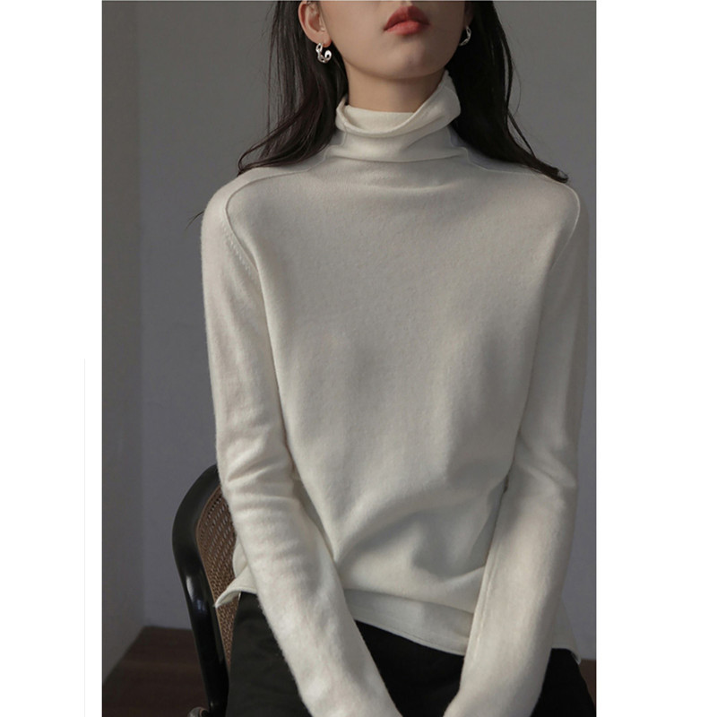 Women's wool sweater, stand-up collar, loose fit with slit