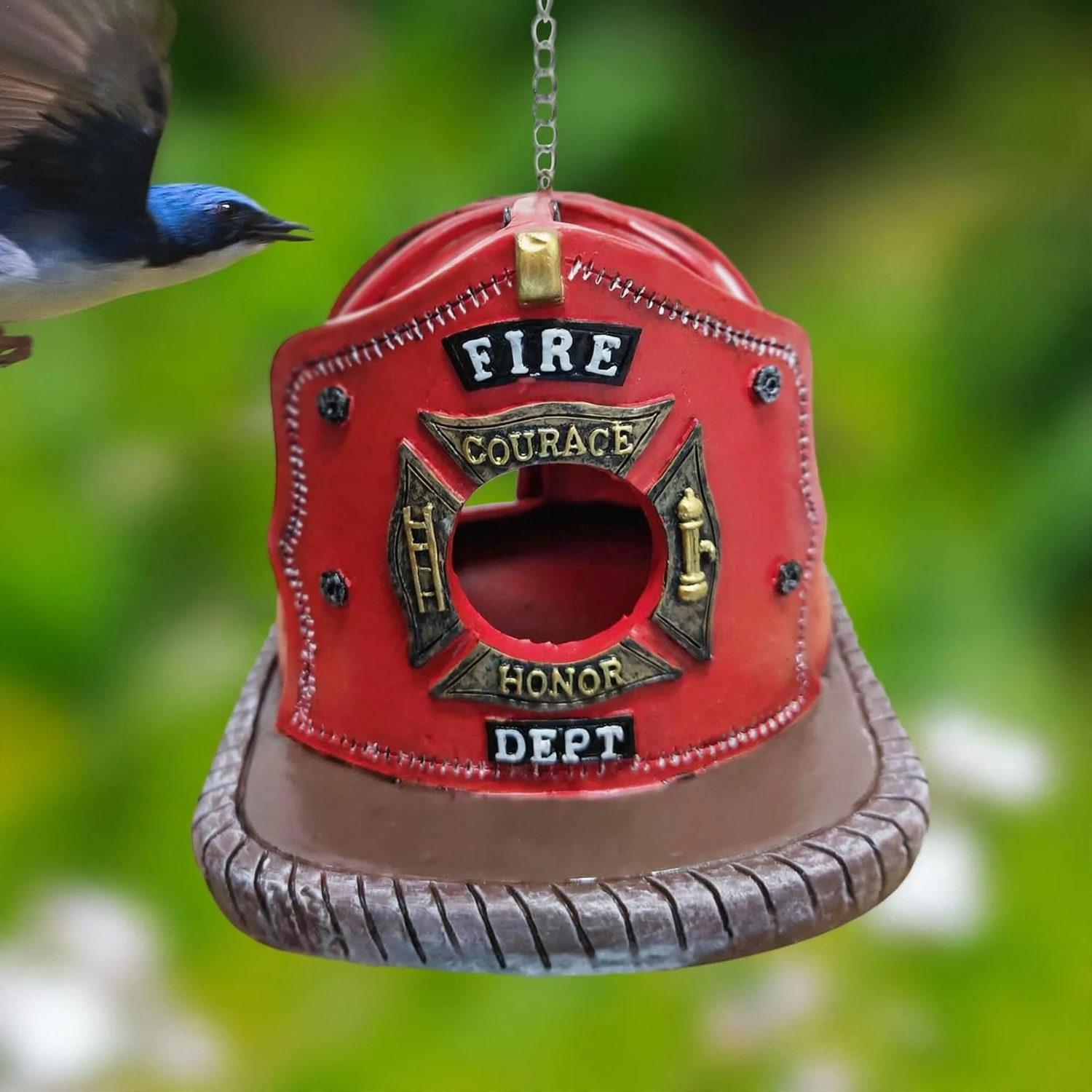 Birdhouse in fire helmet design made of resin