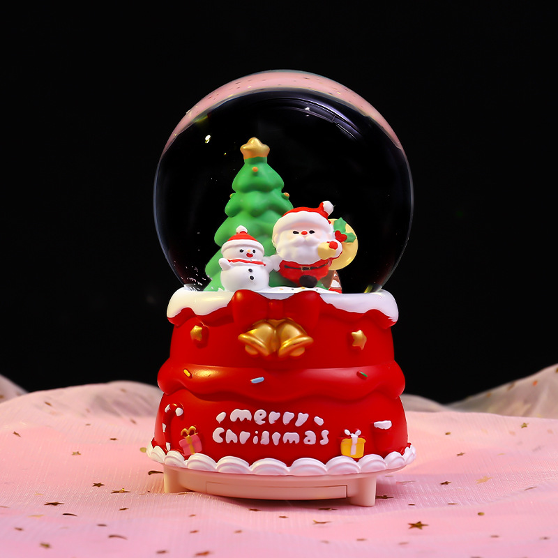 Christmas snow globe with light and music