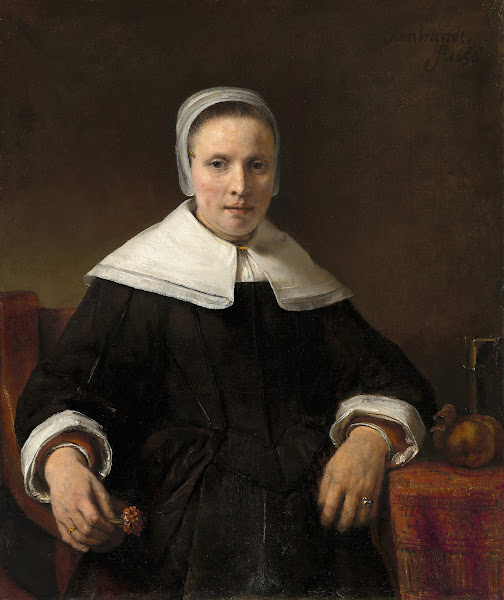 A Woman Holding a Pink 1656