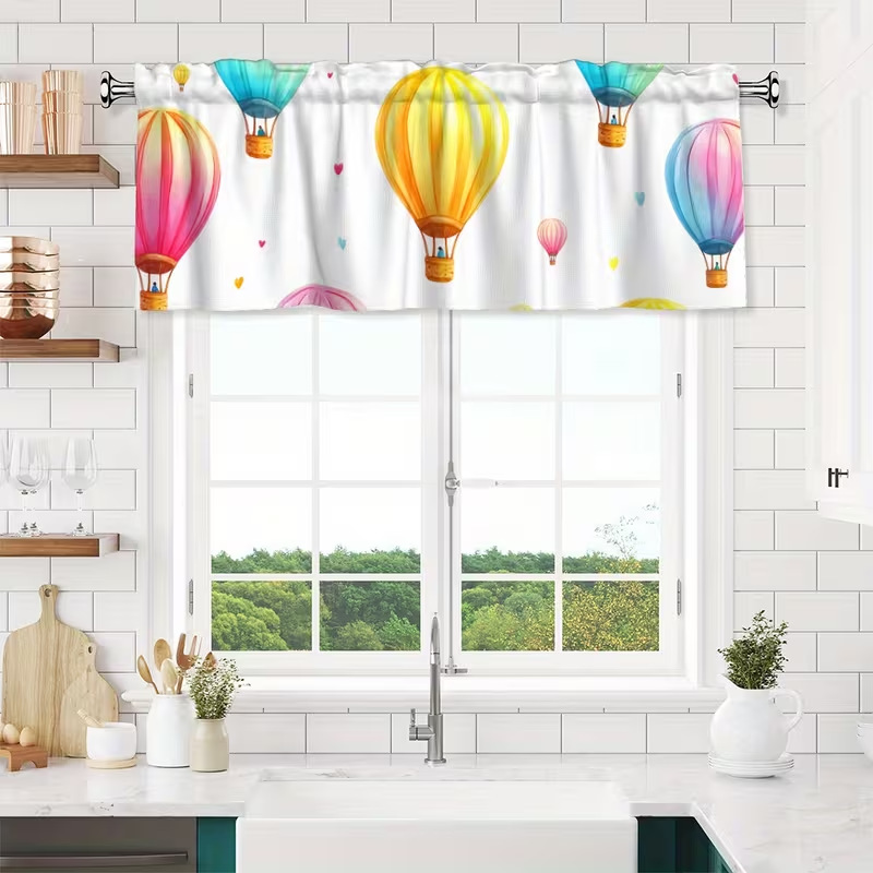 Window curtain with hot air balloon motif
