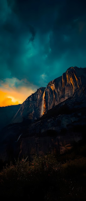 Firefall Illusion on Dark Granite Cliff at Sunset - Free mobile Wallpaper