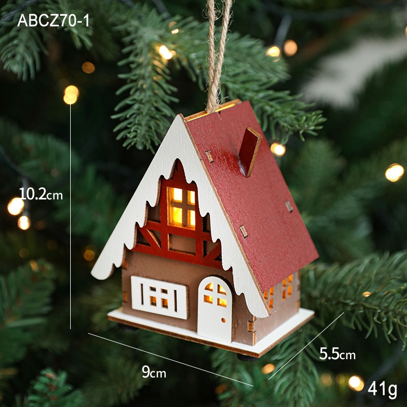Illuminated wooden house for Christmas time