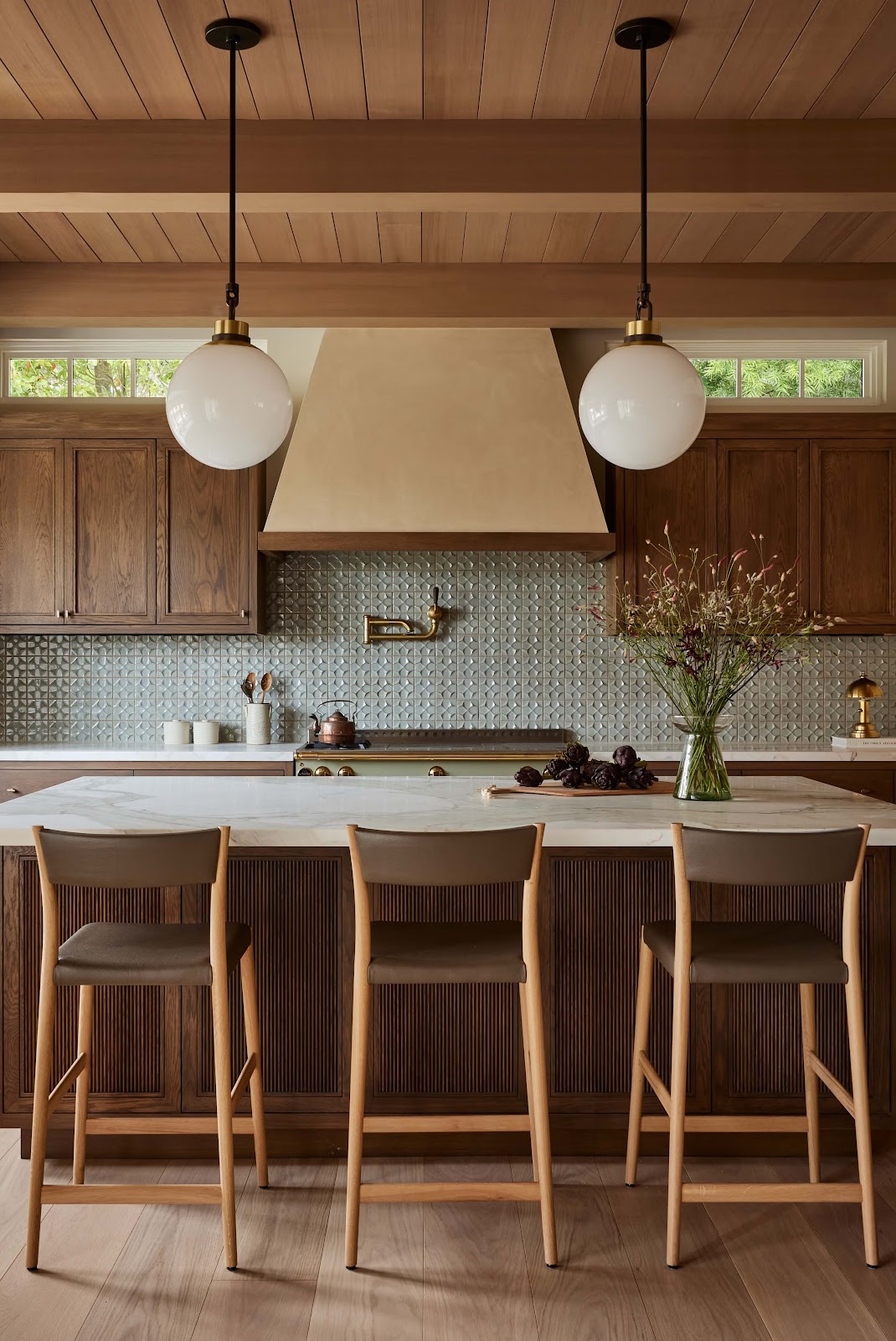 Light wood kitchen with white upper cabinets and open shelving
