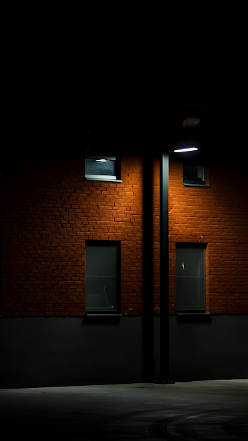 Urban Night Scene Red Brick Wall Illuminated by Streetlight - Free mobile Wallpaper