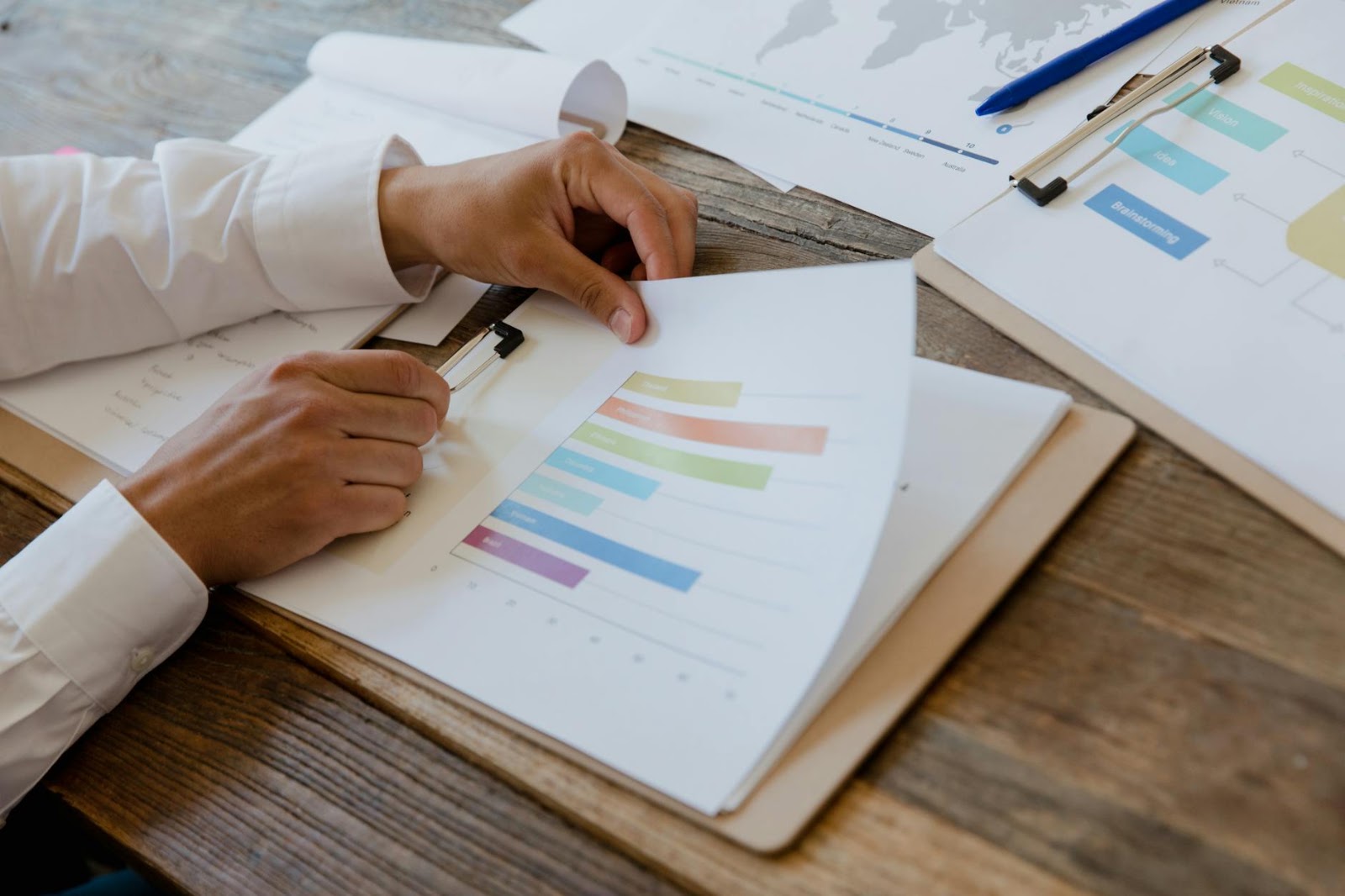 Executive making strategic decisions amidst future AI market trends and AI application price analysis challenges.