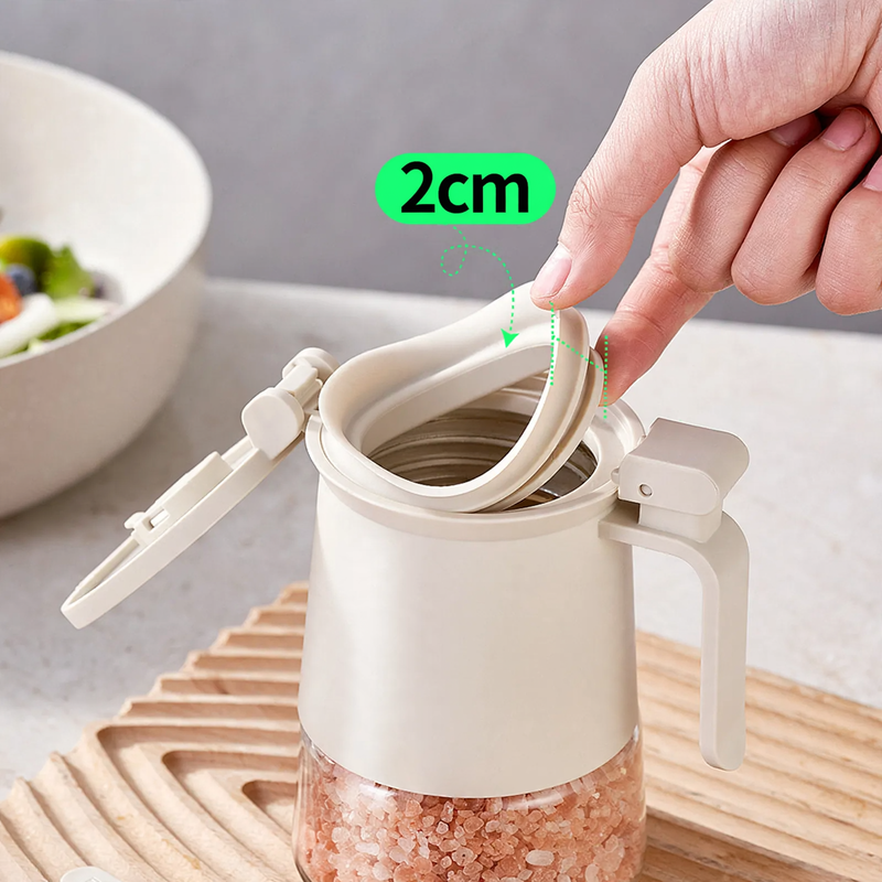Versiegelter Gewürzbehälter aus Glas mit Löffel