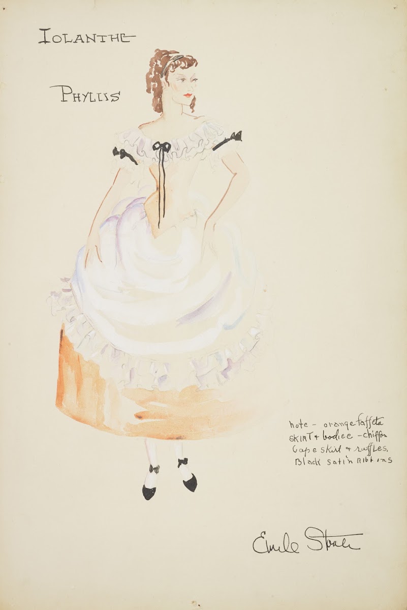 Iolanthe Phyllis orange dress with white ruffled neckline and white apron 1934 1