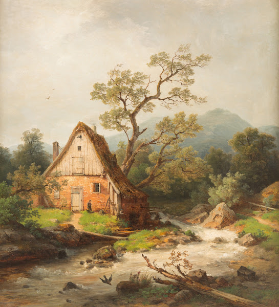 Romantic watermill by a stream