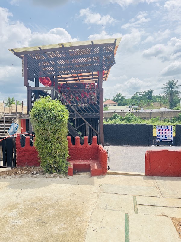 Poolside lounge seating at Point 3 Hotel, Adeiso