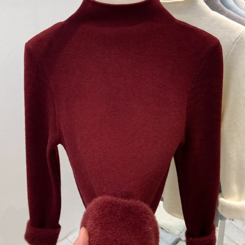 Women's knitted sweater with standing collar and fleece lining