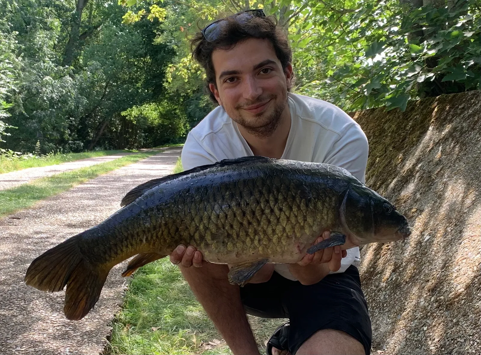 Alex McLatchie with a Carp caught on a bottom bait rig on a local river