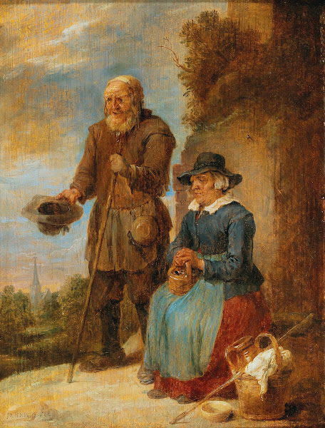 An Old Couple Begging On The Street