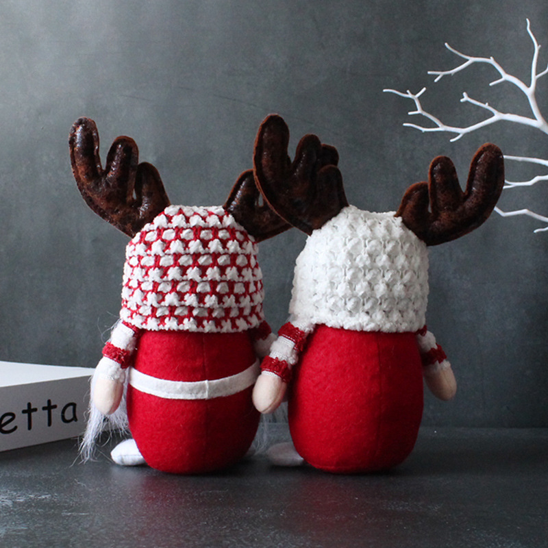 Christmas gnome figure with antler hat, standing