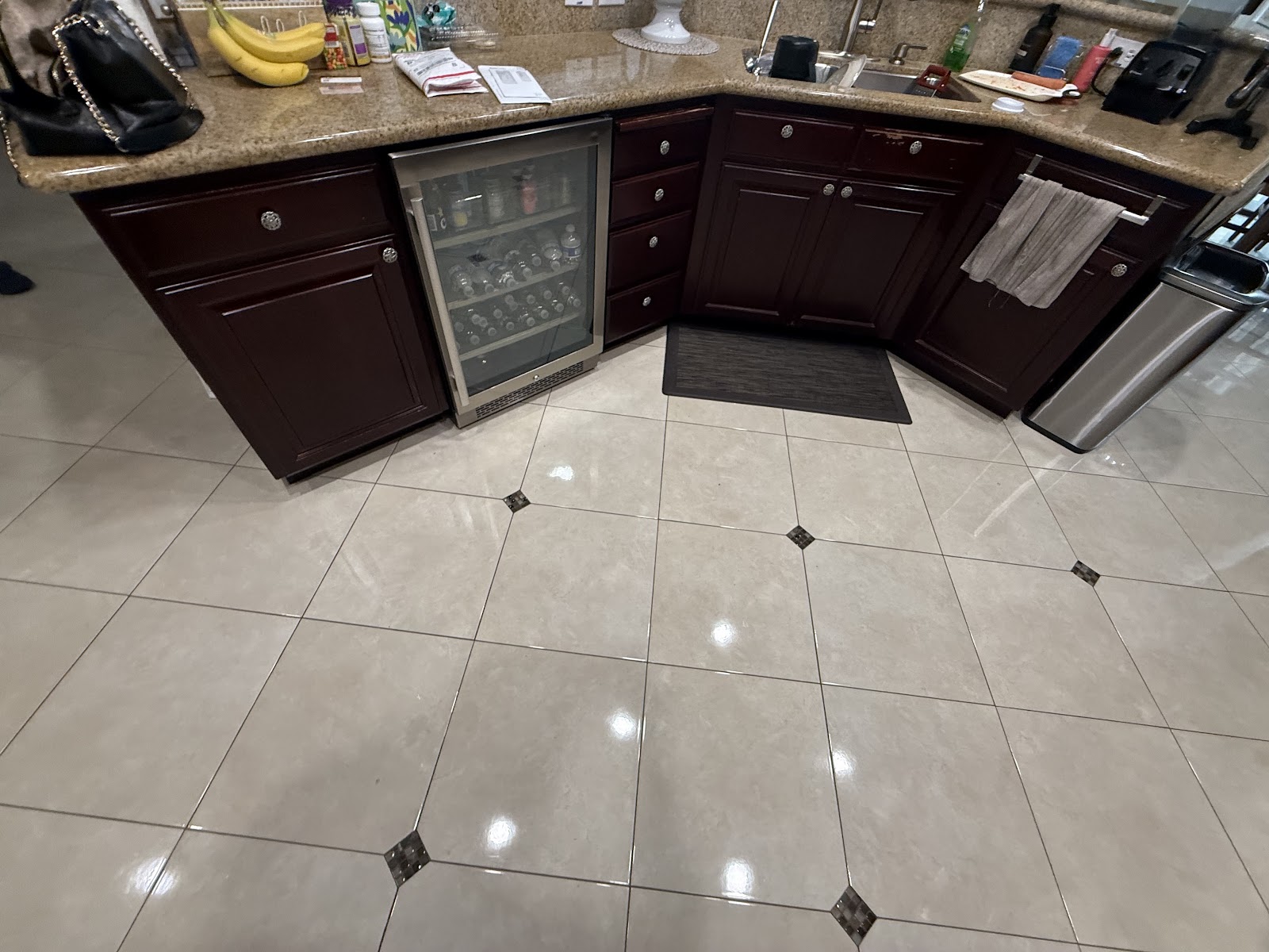 Kitchen with cherry cabinets and built-in beverage cooler
