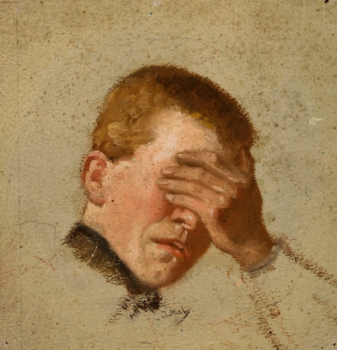 Boy covering his eyes