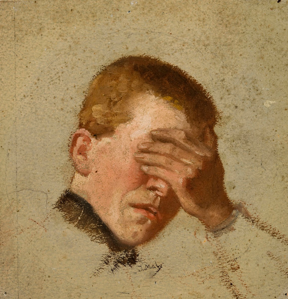 Boy covering his eyes