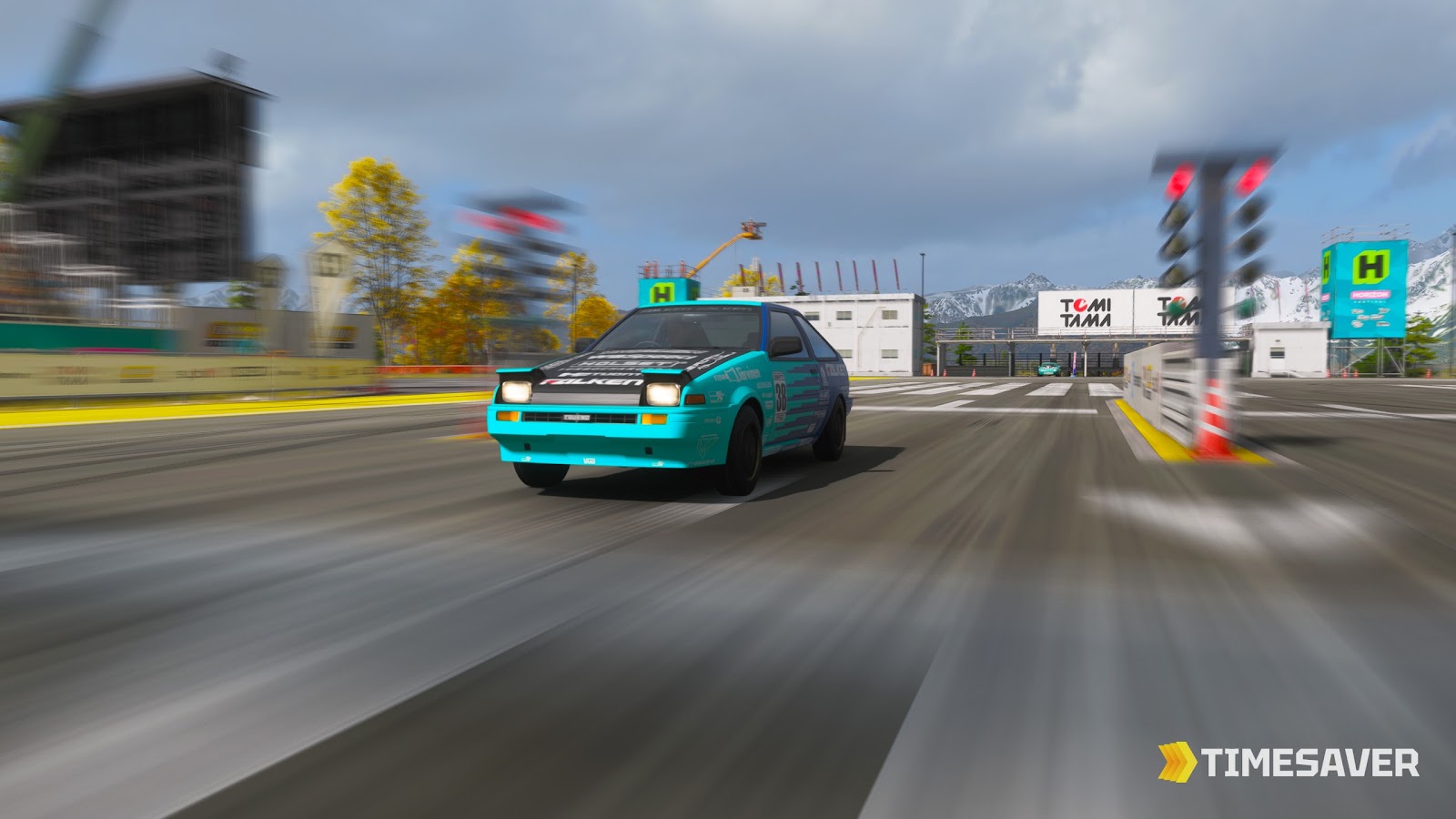 A Toyota AE86 Forza Edition launching off the line at the Forza Horizon 6 drag-strip start lights with motion blur