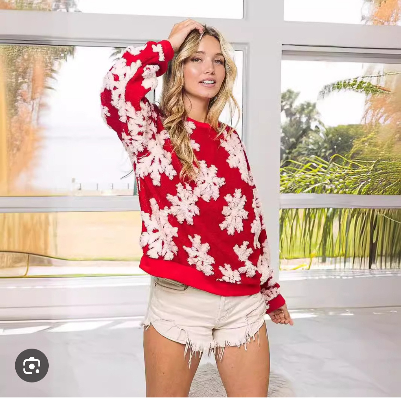 Women's knitted sweater with floral embroidery