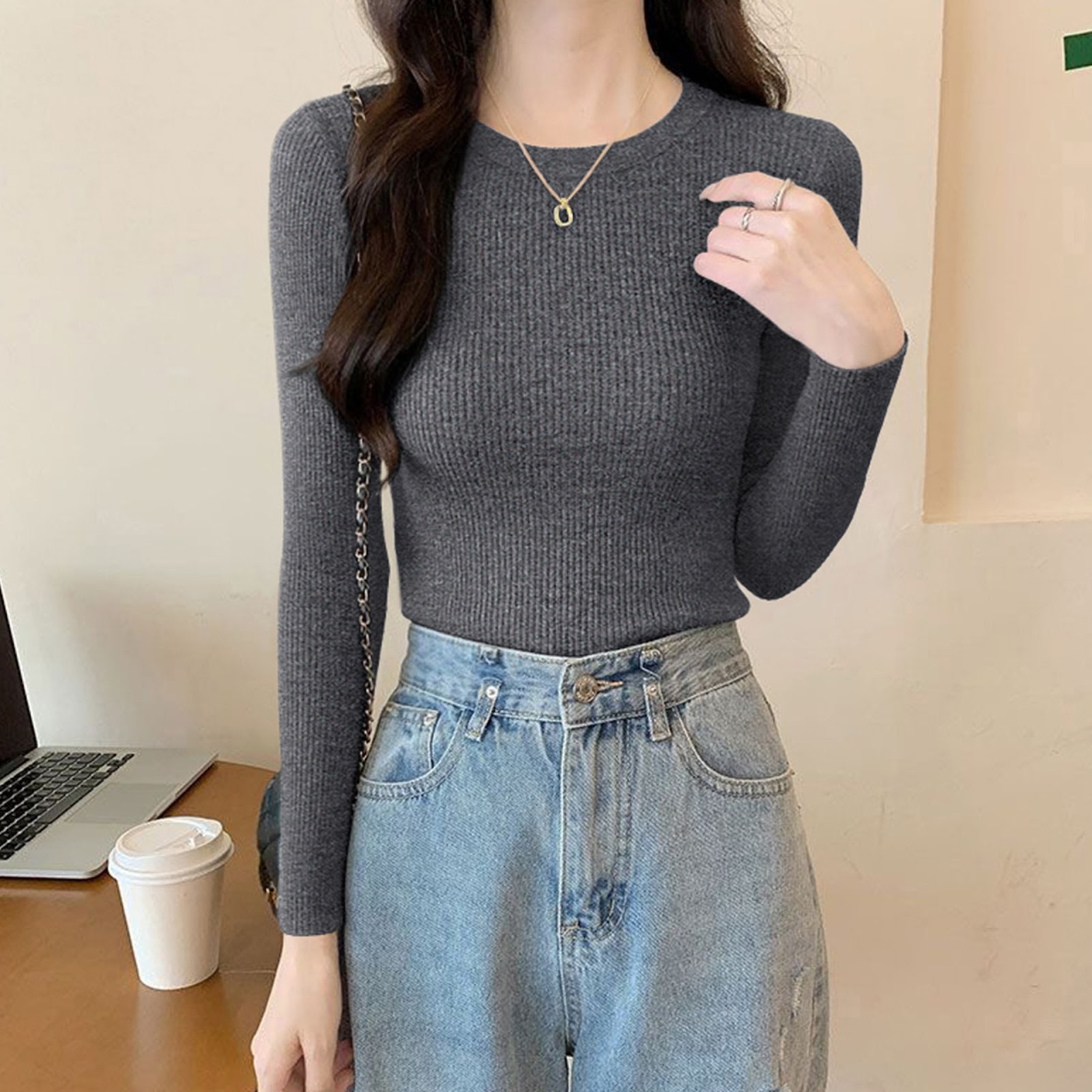 Women's knitted sweater with round neckline