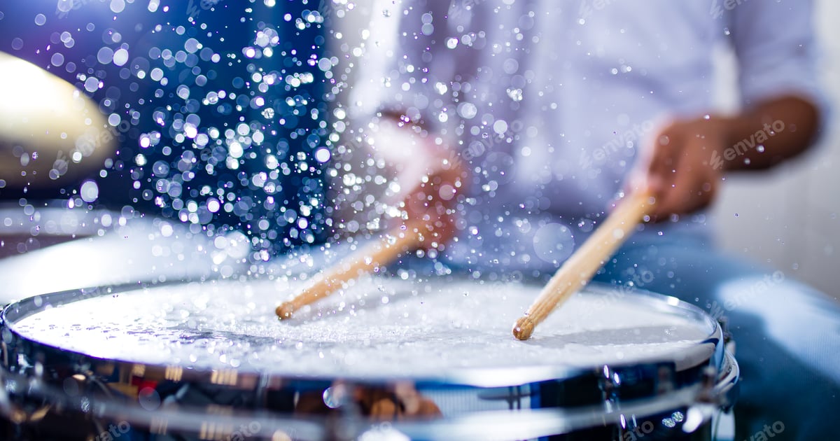Drummer Playing Drums with Water Splashing Free Download – Envato Elements