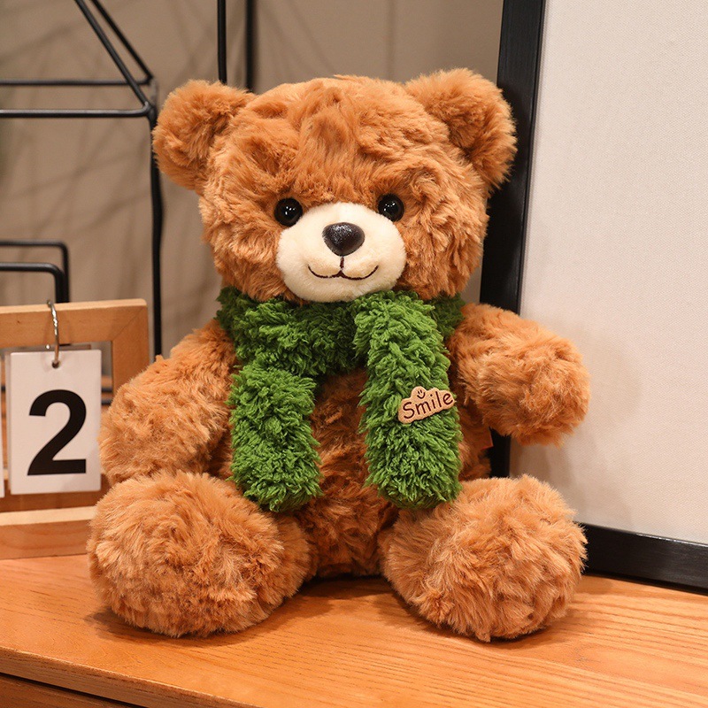 Großer Plüsch-Teddybär mit Seidenschleife