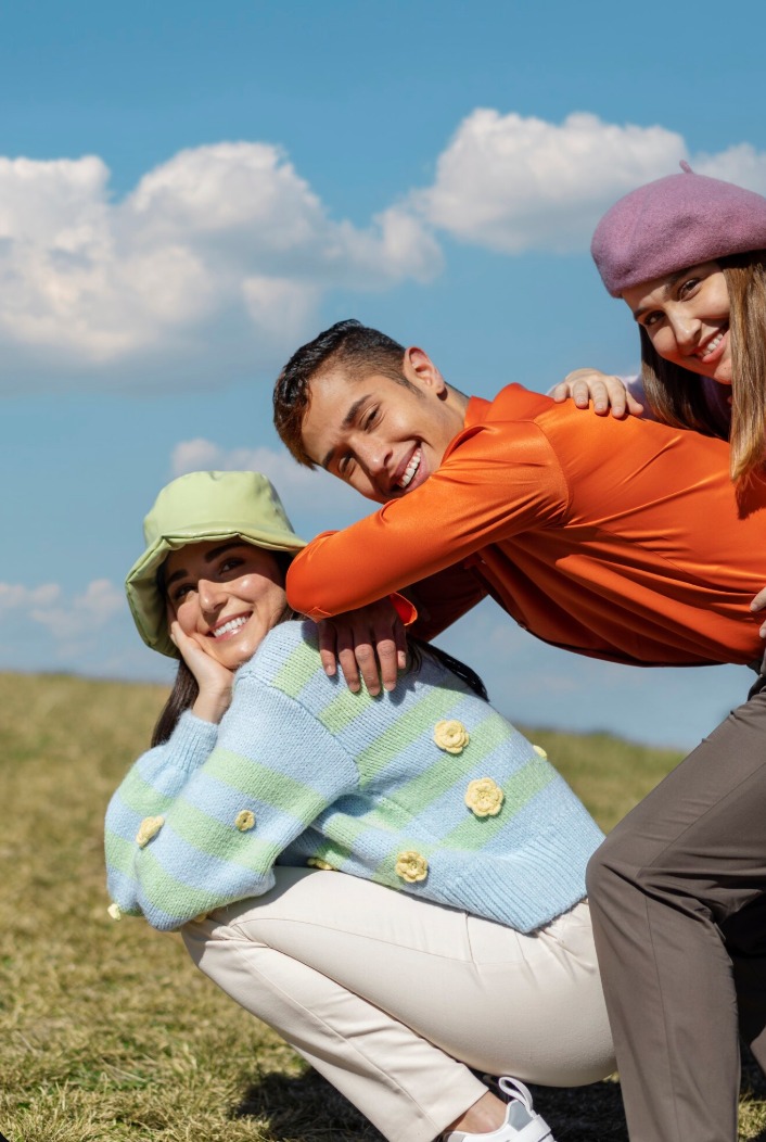 Young adults on a grassy hill