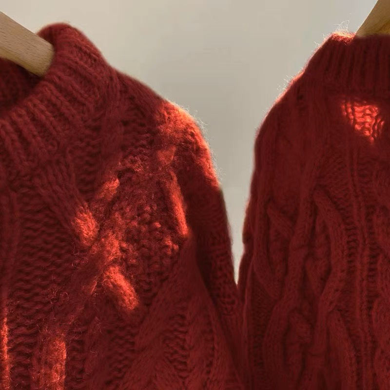 Chunky knitted sweater with cable pattern