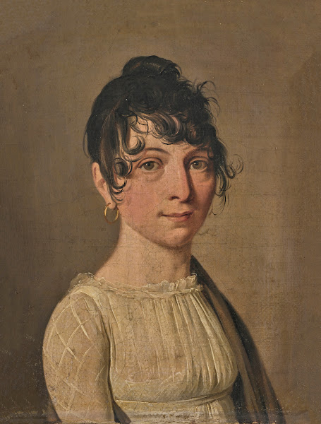 Portrait of a young woman in a white dress