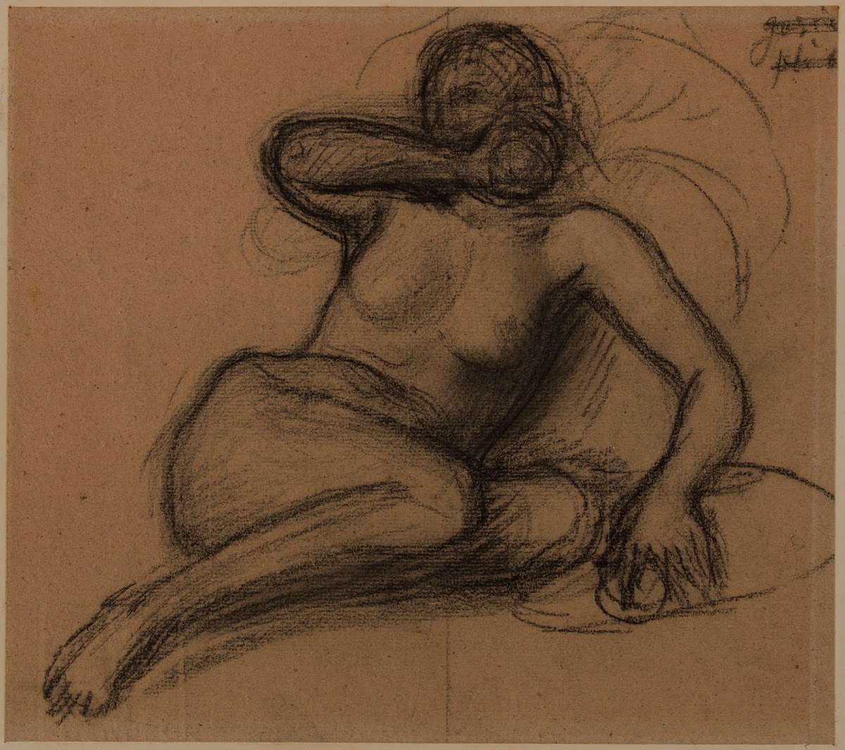 Femme nue à demi étendue