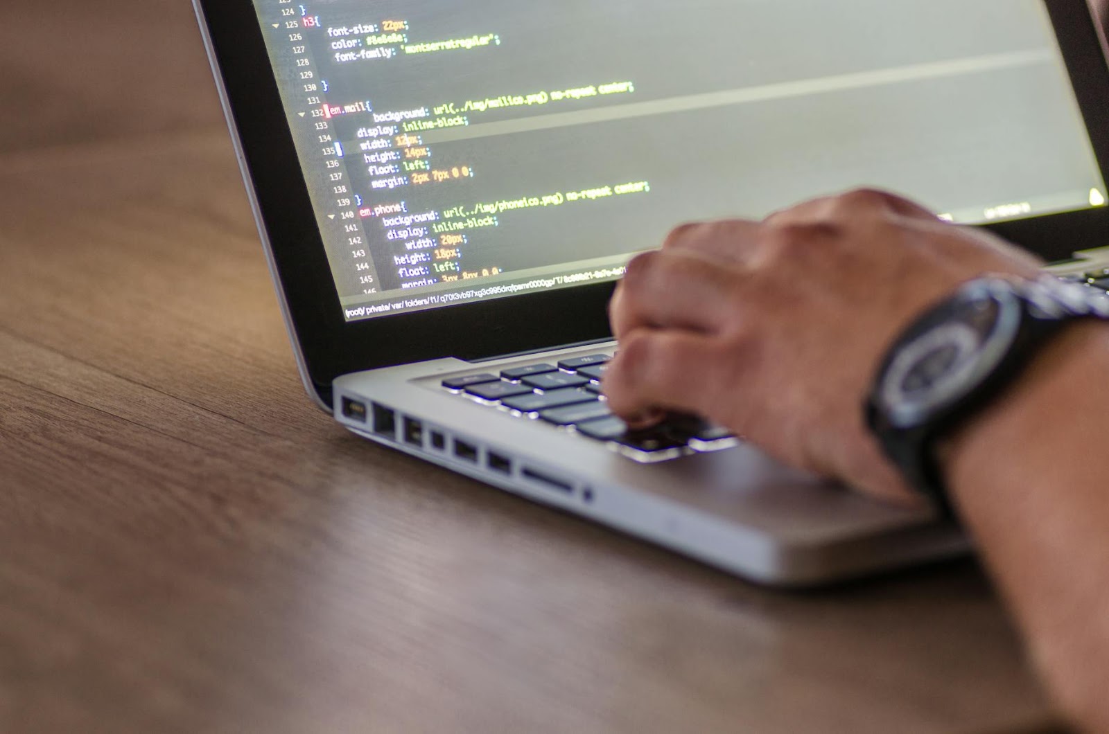 A Web3 developer focused on coding smart contracts, illustrating the high demand for blockchain development skills.