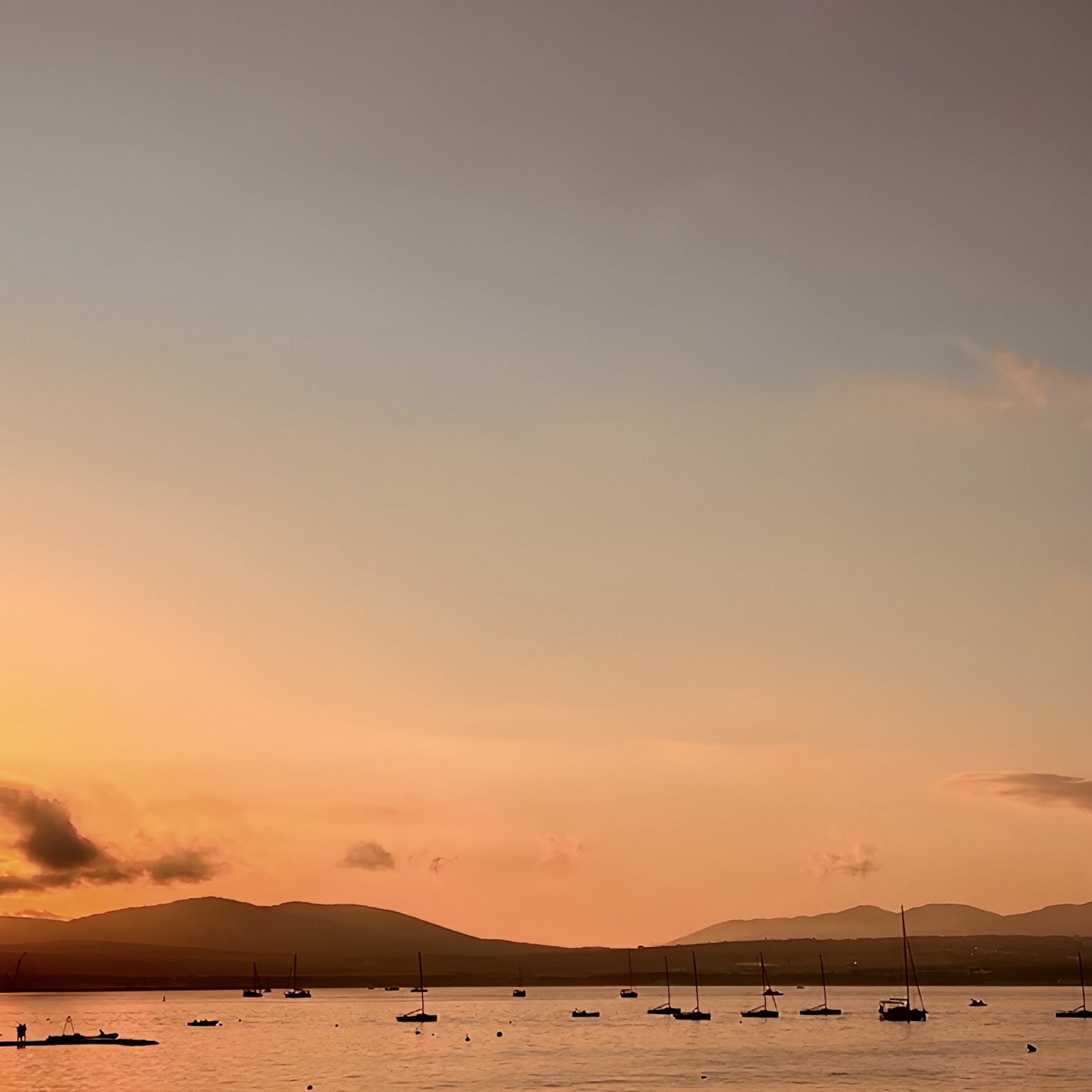 Download Sunset Over Quiet Ocean Waters Full HD iPhone