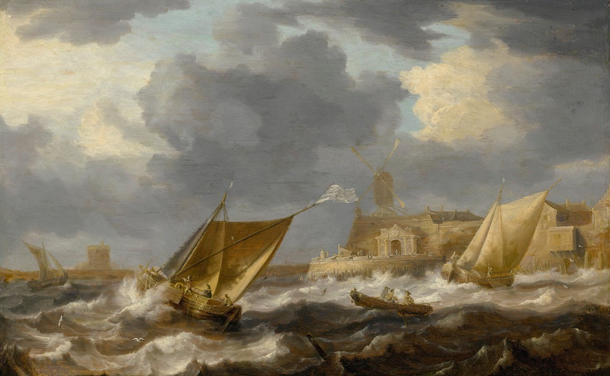 Vessels And A Rowing Boat On Choppy Waters Near A Small Harbor Town With A Windm