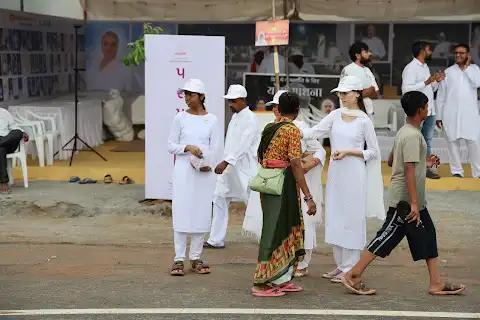 Visitors explore the camp.